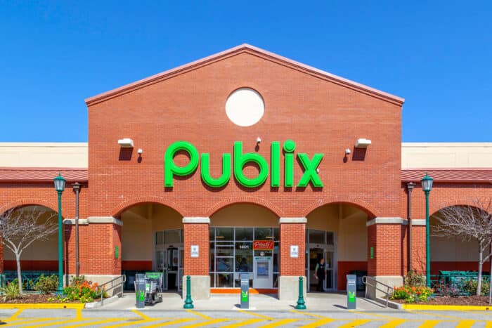 Exterior of a Publix store against a blue sky.