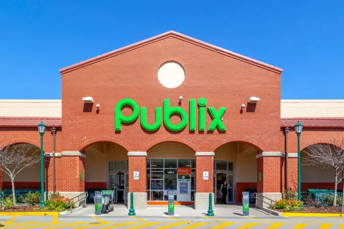 Exterior of a Publix store against a blue sky.