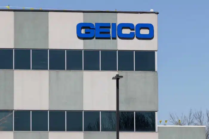 GEICO Insurance office. GEICO is a subsidiary of Berkshire Hathaway - class action