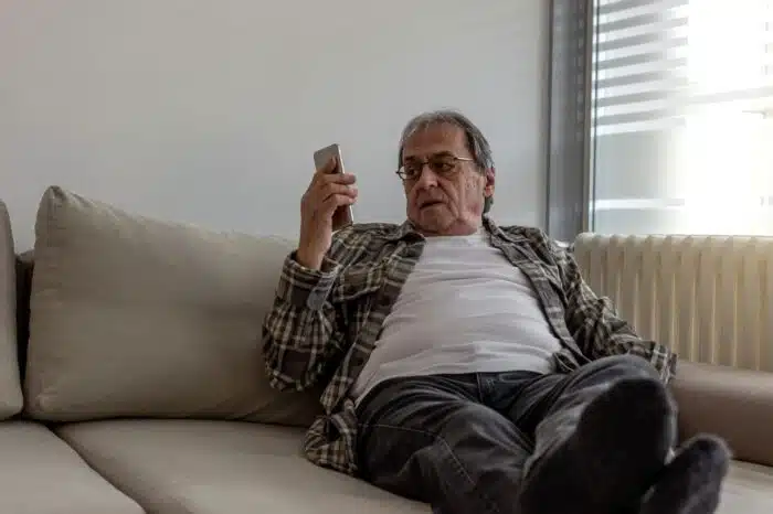 Senior man receiving unwanted call - Shellpoint debt-collection settlement, class action lawsuit