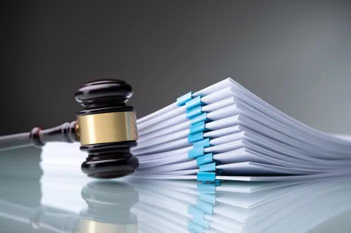 Piles Judicial Court Files And Judge Gavel, TackleDirect lawsuit files requesting reasonable attorneys’ fees and costs for dropped ADA lawsuit