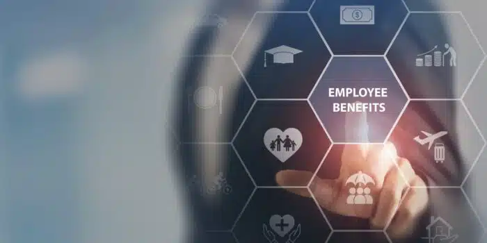 Employee benefits concept, finger push screen button labeled employee benefits - Total Staffing Solutions wage-and-hour lawsuit settlement