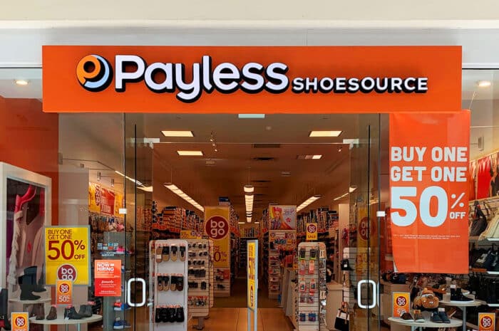 Exterior of a Payless store inside of a shopping mall.