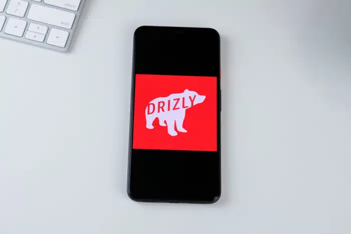 Drizly app logo on a smartphone screen.