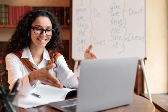 Online Education. Female English teacher having video conference chat with students. VIPKid teacher