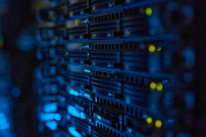 Close up image of rack server with blinking lights in supercomputer. Data breach concept - talbert house lawsuit