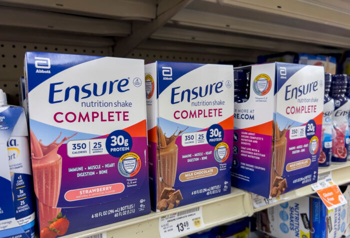 Close up, selective focus on Ensure nutritional drinks for sale inside a Safeway grocery store.