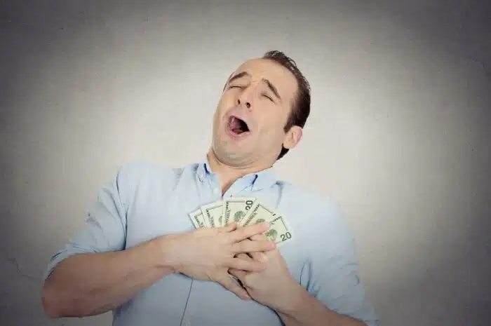 Closeup portrait happy excited man with money