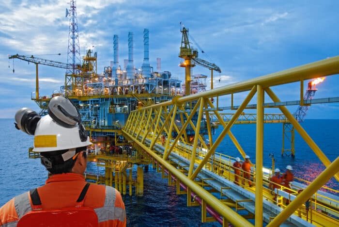 A worker working on an oil rig - amplify energy lawsuit