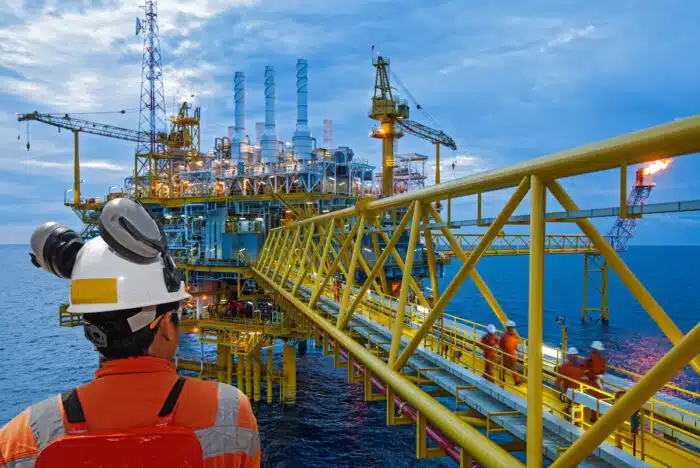 A worker working on an oil rig - amplify energy lawsuit