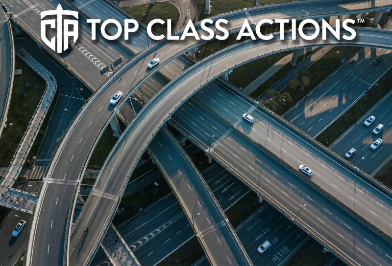 Top up aerial drone view of elevated road and traffic junctions.