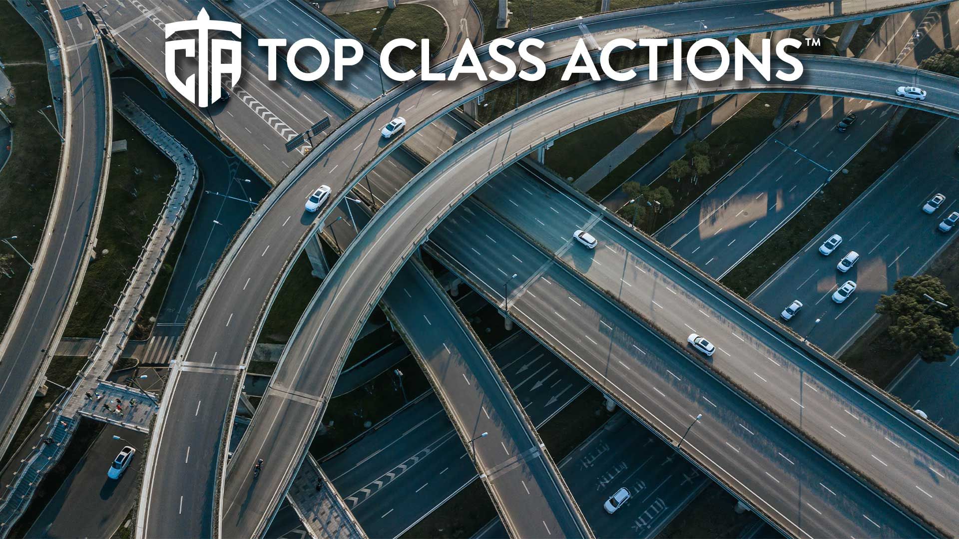 Top up aerial drone view of elevated road and traffic junctions.