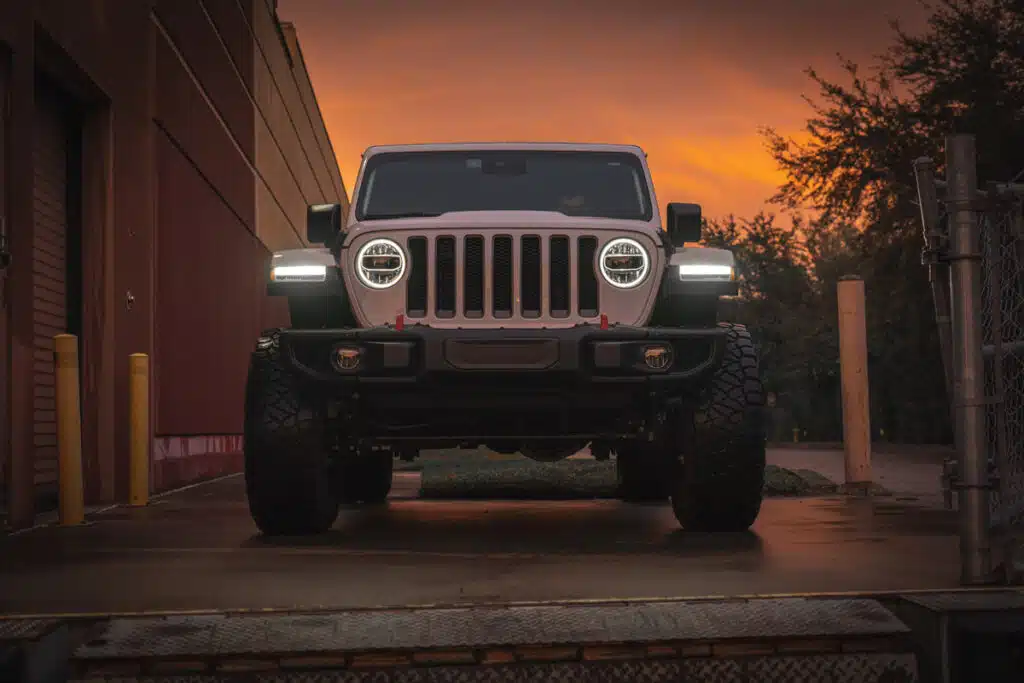 Jeep Wrangler Rubicon parked after a winter rain storm.