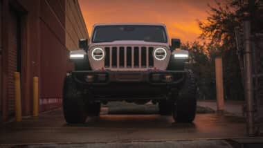 Jeep Wrangler Rubicon parked after a winter rain storm.