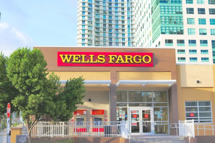 Exterior of a Wells Fargo location on a sunny day.