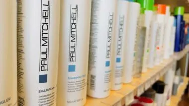 Selective focus on Paul Mitchell products on a shelf.