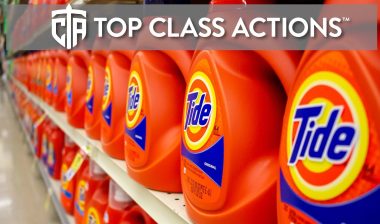A view of several containers of Tide laundry detergent, at the grocery store.