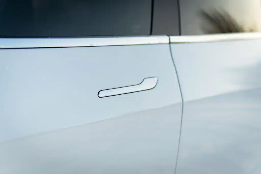 Close up of a Tesla door handle.