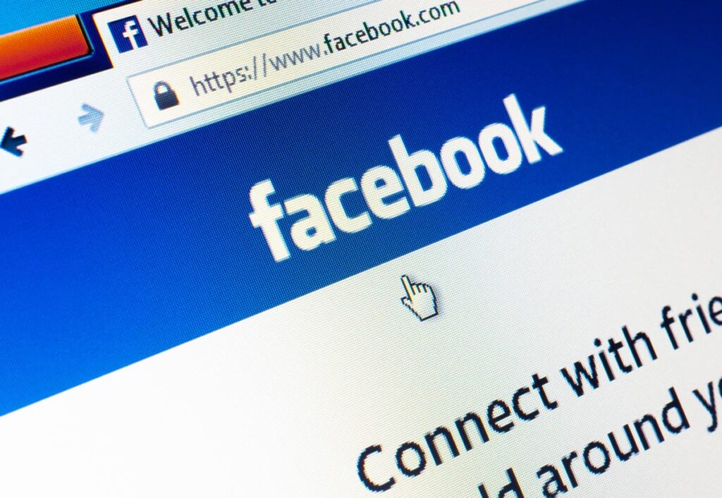Facebook.com homepage on the screen, representing the Meta settlement