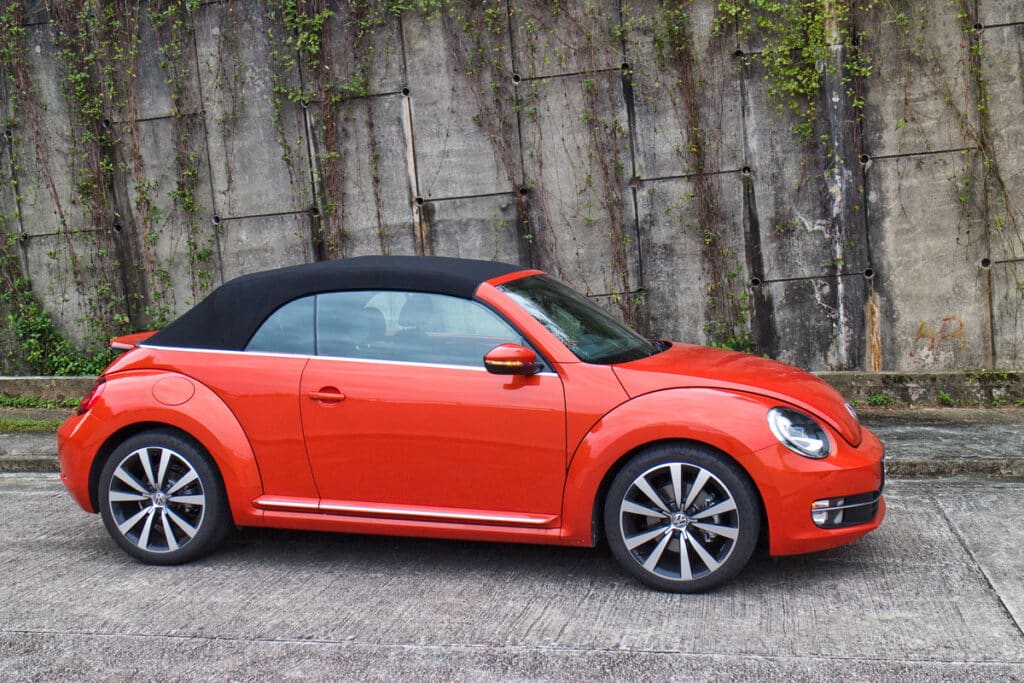A red Volkswagen Beetle Convertible.