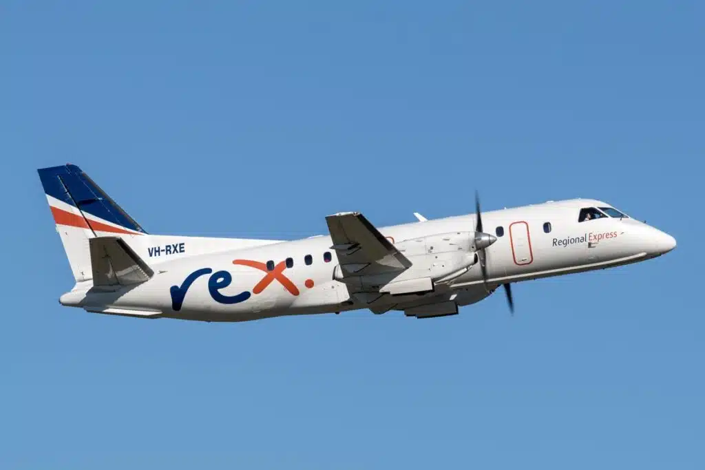 A Regional Express plane flying in the air.