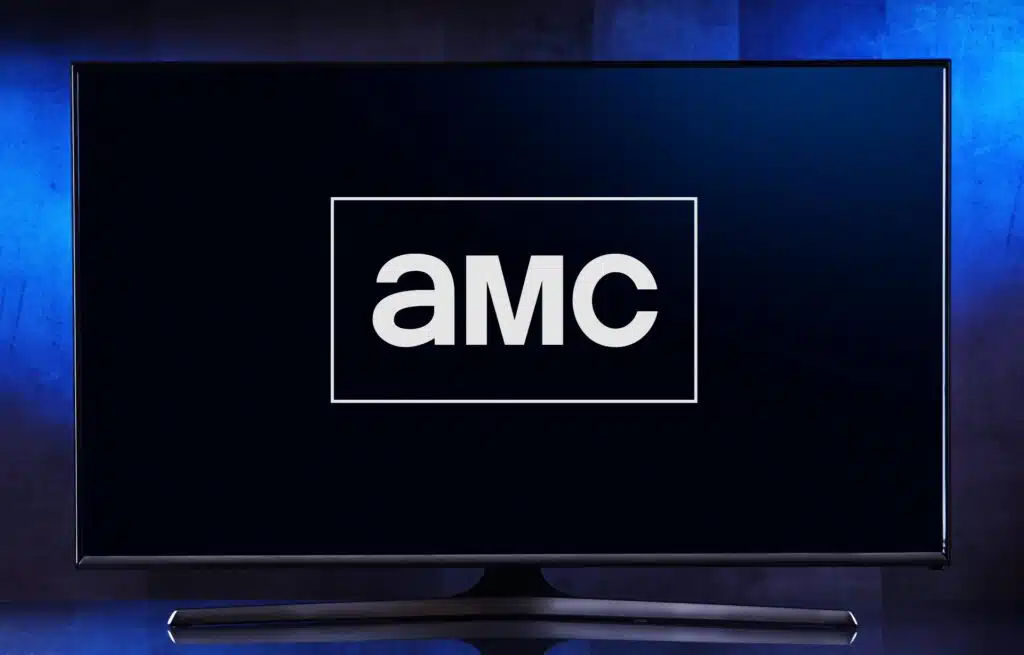 The AMC logo is seen on a TV, representing the AMC class action lawsuit.