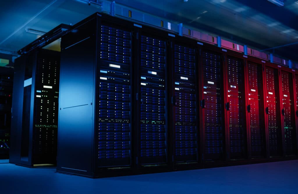 Shot of Data Center With Multiple Rows of Fully Operational Server Racks.