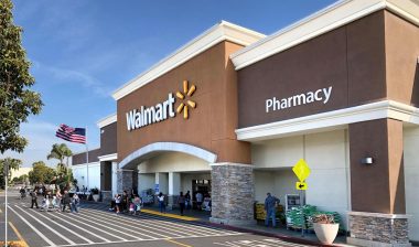 Exterior of a Walmart store on a sunny day.