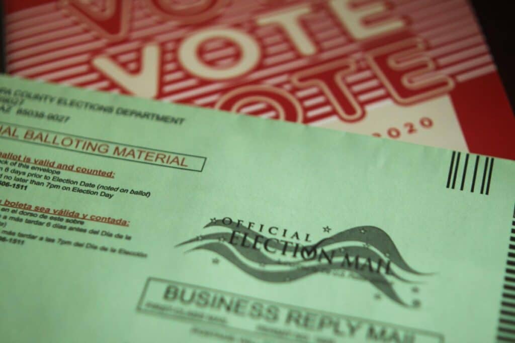 A 2020 election ballot with an envelope requiring a signature, representing the Navajo Nation lawsuit