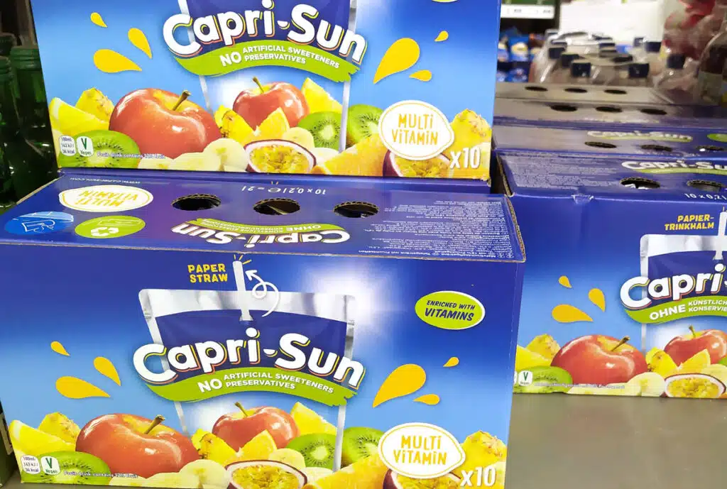 View of Caprisun boxes on a shelf.