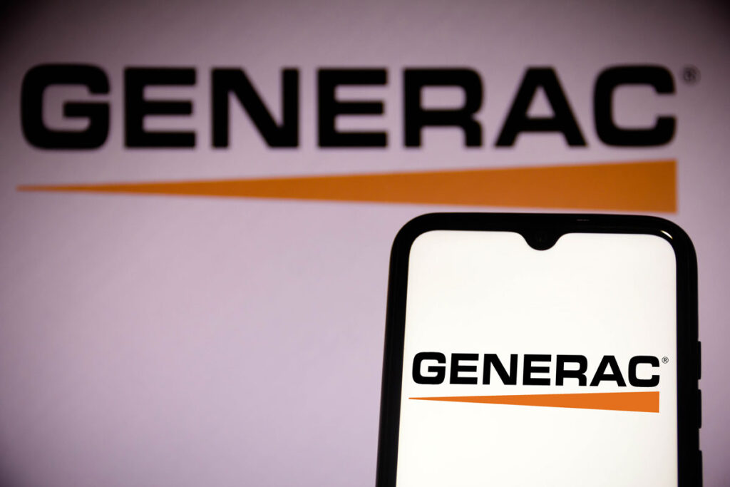 Generac Holdings logo seen on a smartphone screen and in the background.