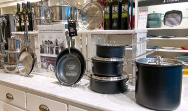 The Nonstick All Clad pot and pan aisle at a Williams Sonoma store at an indoor mall.
