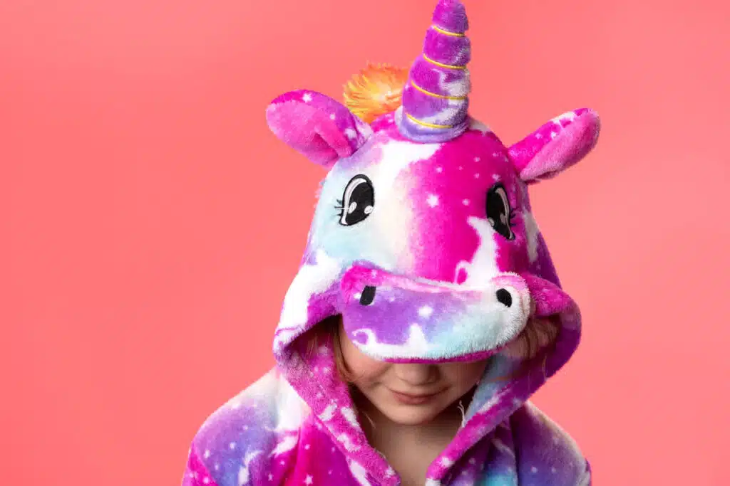 Close up of a young girl wearing unicorn cosplay pajamas - NewCosplay recall, children's pajamas recall