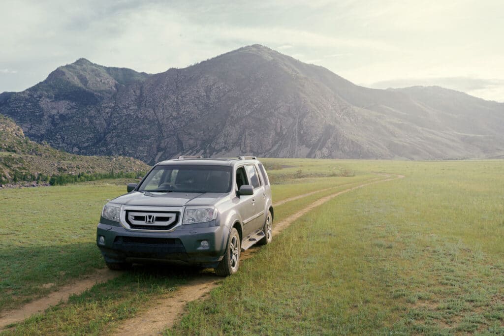 A 2020 Honda Pilot in the countryside.