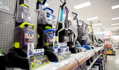 Various Bissell vaccuums for sale at a store.