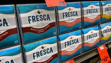 Close up of Fresca packages for sale on a grocery store shelf.