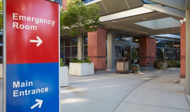 Main Entrance Of Modern Hospital Building With Signs, representing the Katherine Shaw Bethea Hospital data breach settlement.