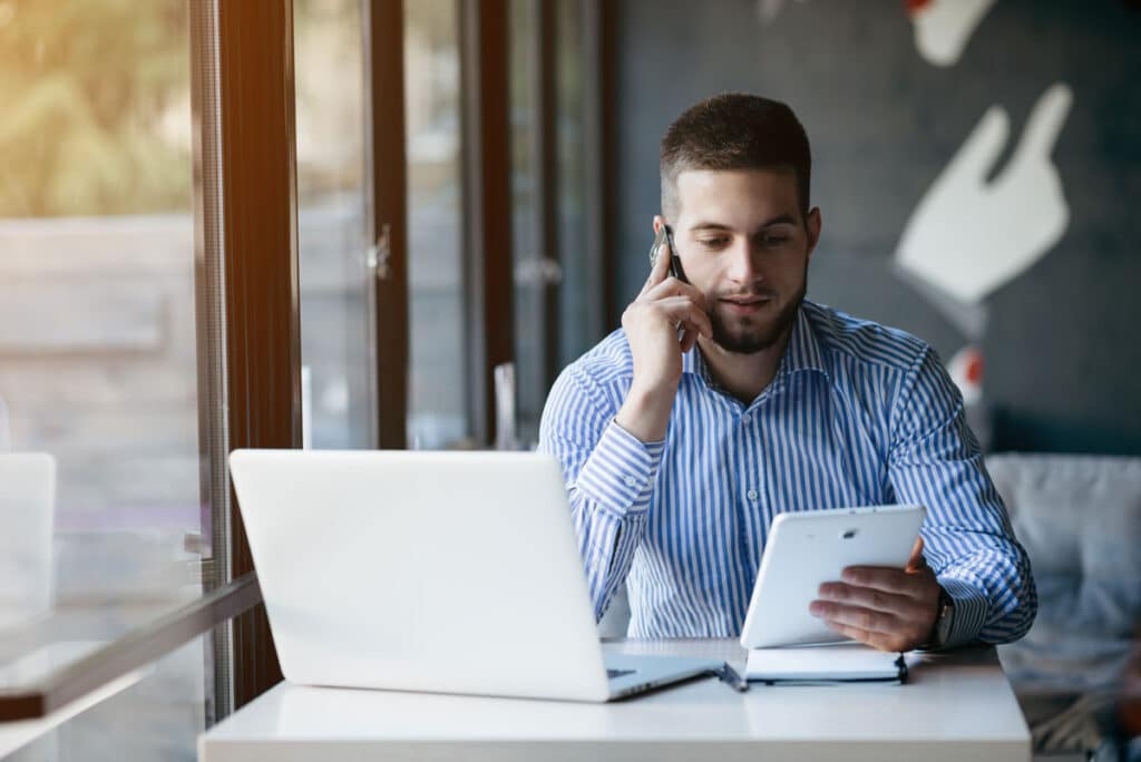 A young man working from home - remote work