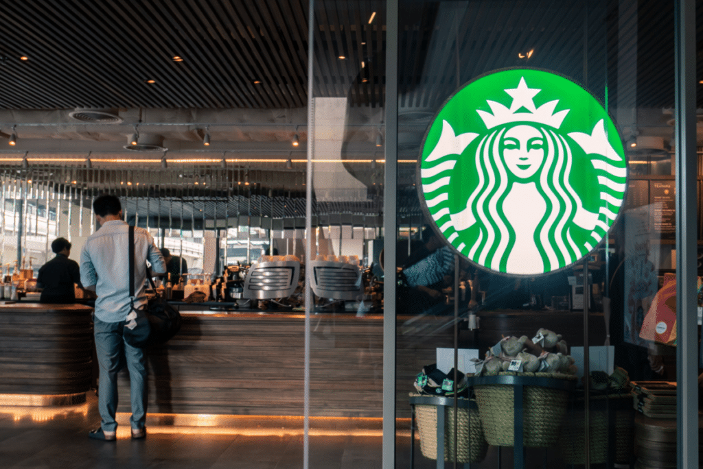 Starbucks Sign on Glass Store Front