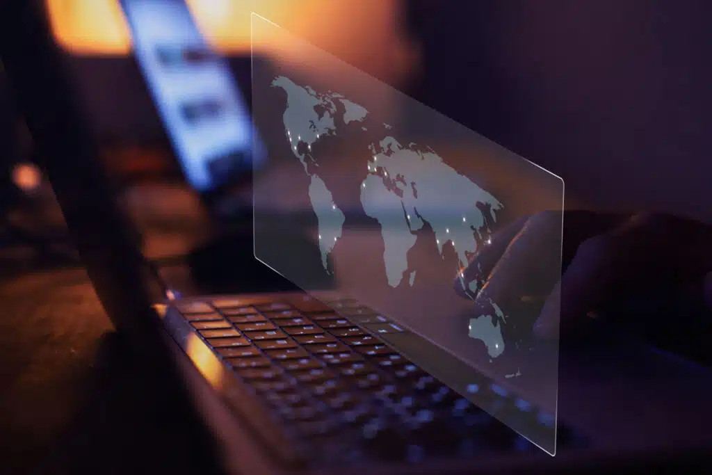 Laptop with holographic picture of the world, representing the FTC Kochava lawsuit.
