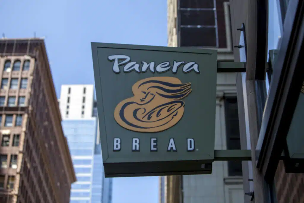Panera Sign hanging outside on building