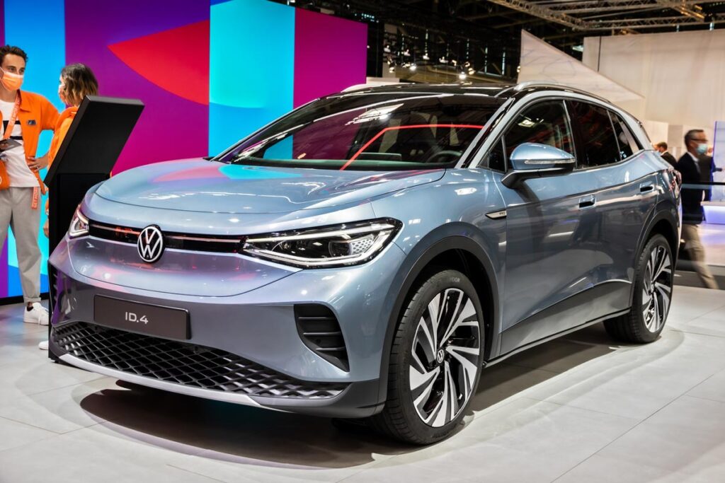 Volkswagen ID.4 all-electric SUV-coupe car showcased at a car show.