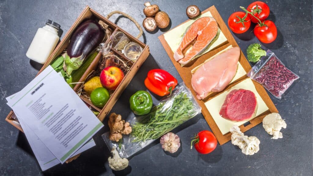 Meal box with food in it and recipe on top