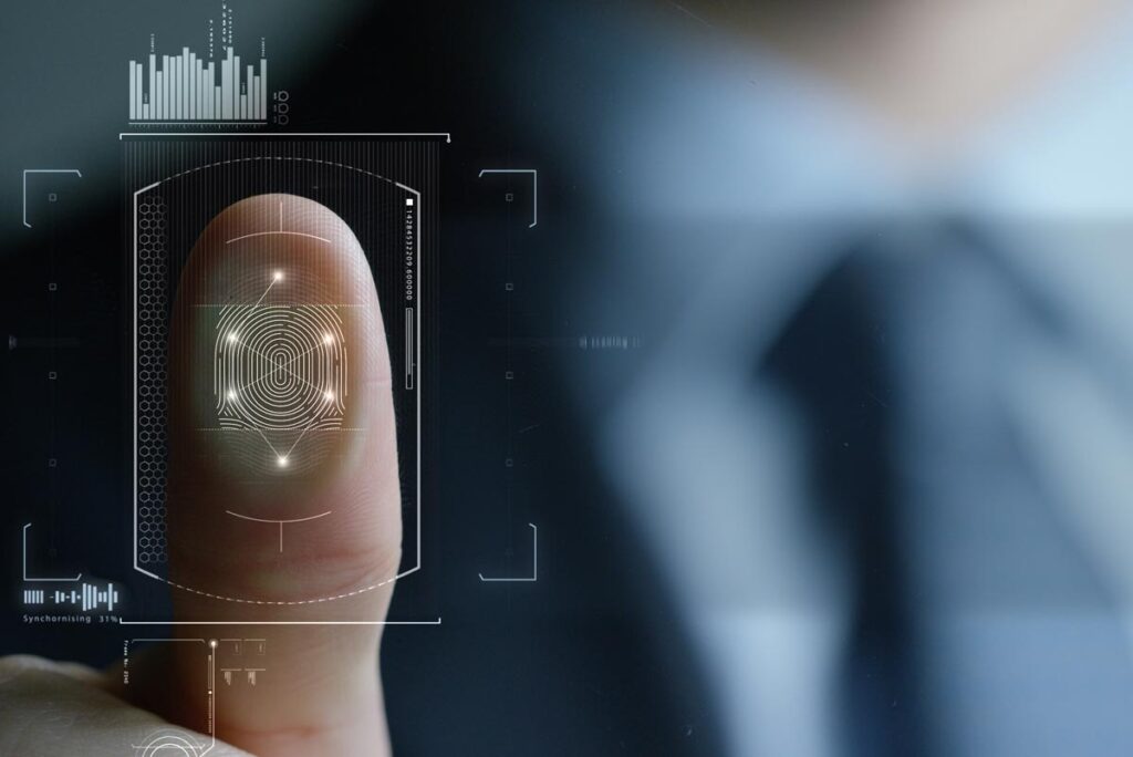 Close up of mans hand scanning his fingerprint, representing the Pacesetter BIPA biometric information class action settlement.