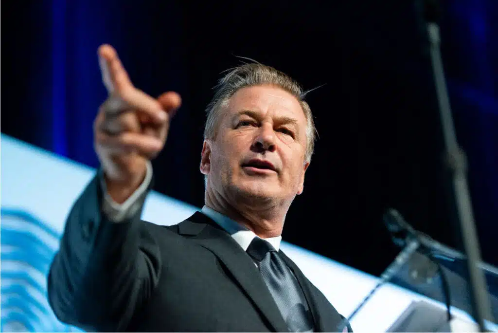 Alex Baldwin points a finger, representing the "Rust" lawsuit.