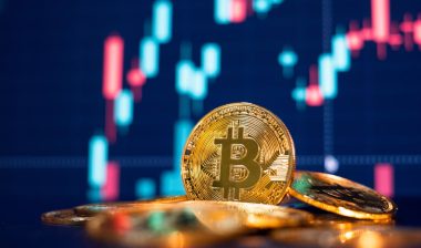 Bitcoin coins with stock graph behind representing the GAW Miners and ZenMiner cryptocurrency