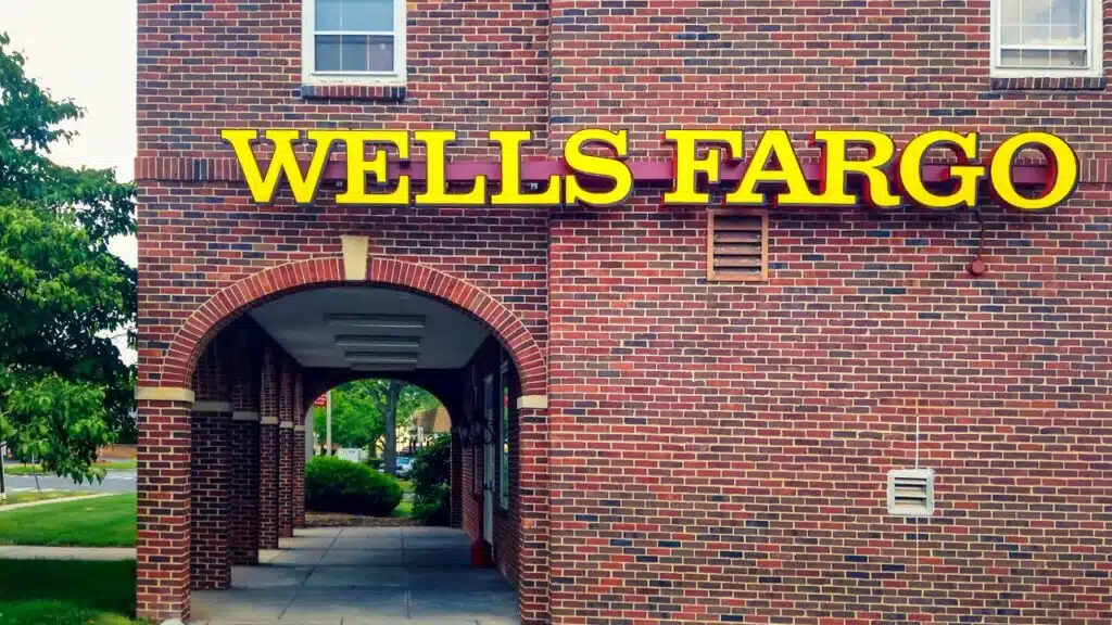 Wells Fargo signage on side of bank, representing the Wells Fargo and Equitybuild class action lawsuit settlement.