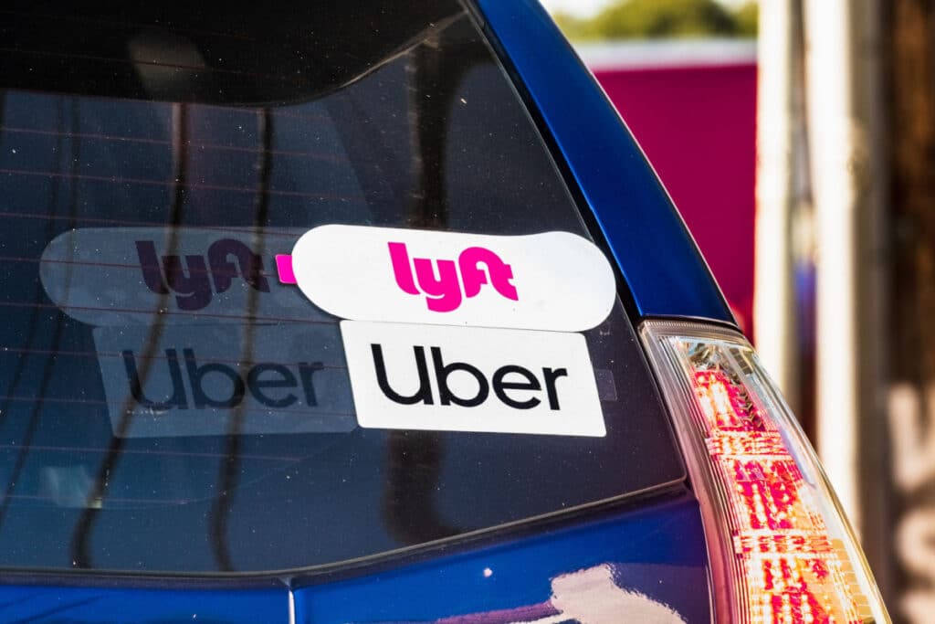 Uber & Lyft stickers on back window of car