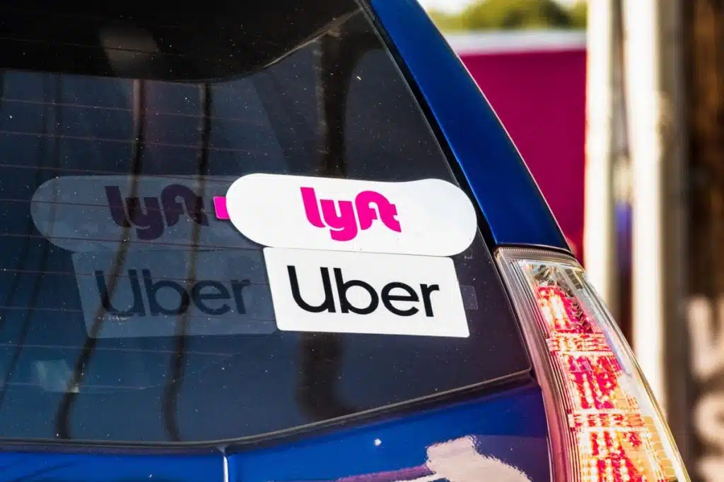 Uber & Lyft stickers on back window of car