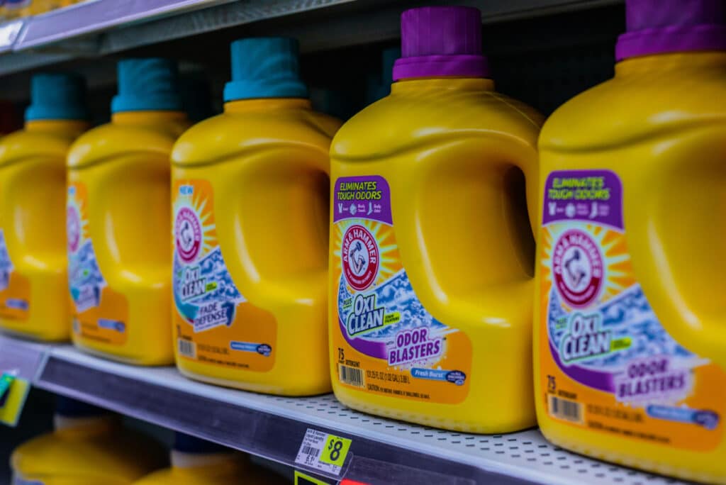 Arm & Hammer laundry detergent on store shelf.